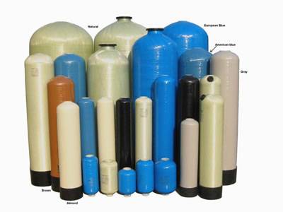 Vertical FRP vessels in different sizes and colors, are put together.