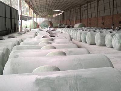 FRP septic vessels are stored in the warehouse.
