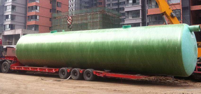 A FRP septic vessel in large size is delivered to a construction site.