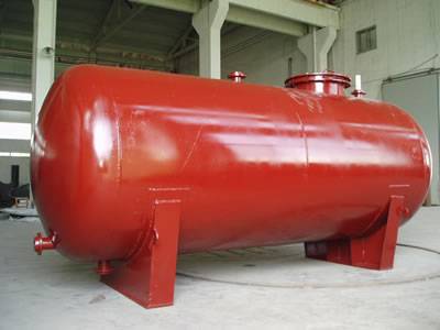 This is a FRP chemical storage tank in red.