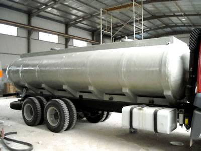 There is a FRP transportation tank with white coated.