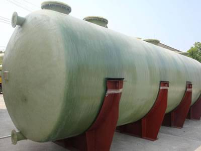 This is a horizontal FRP tank with four red saddle supports.