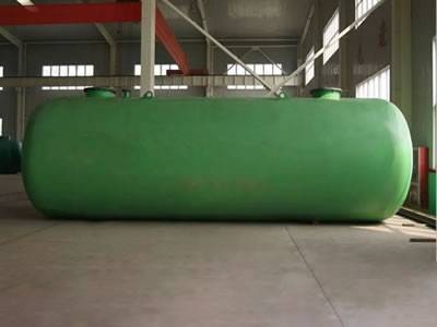 This is a double-wall FRP oil storage tank in green.